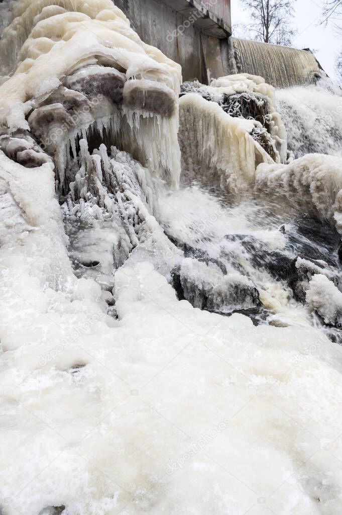 Partly frozen Keila-Joa waterfall in winter near Tallinn, Estonia