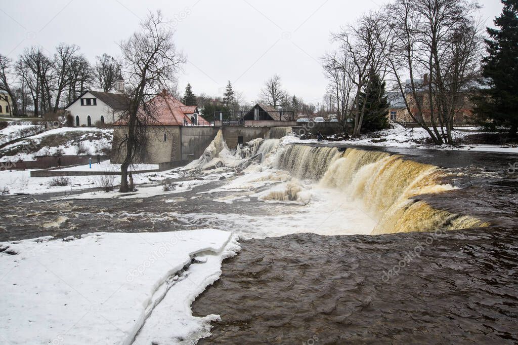 Partly frozen Keila-Joa waterfall in winter near Tallinn, Estonia