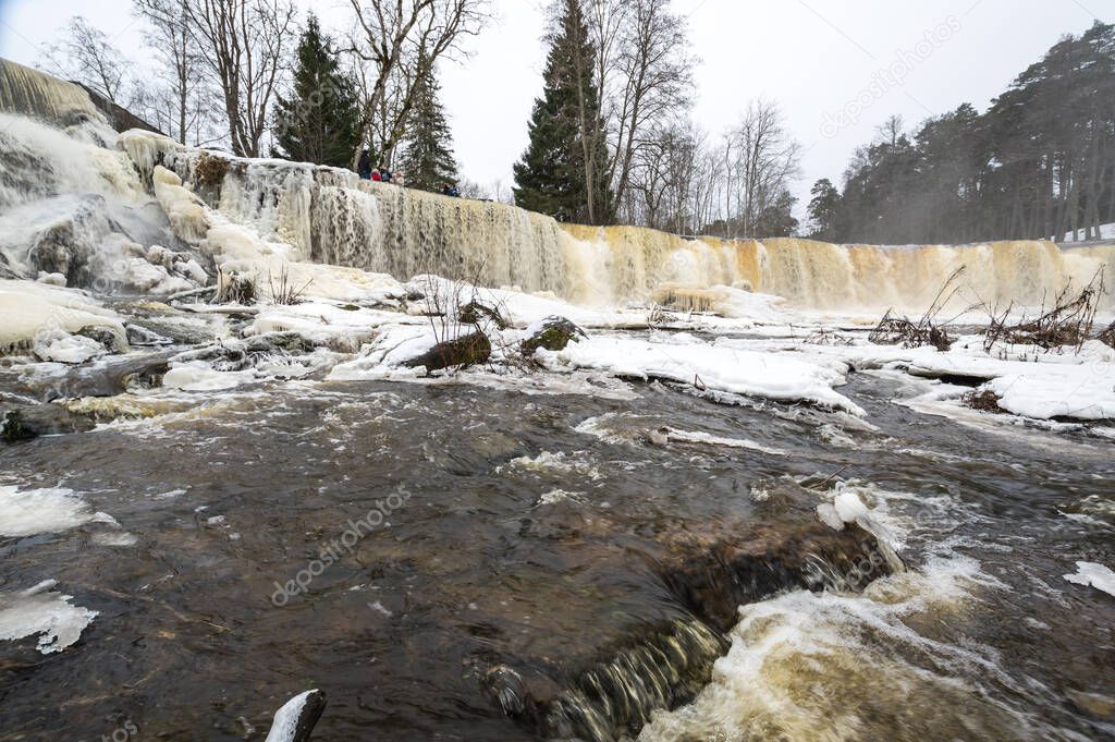 Partly frozen Keila-Joa waterfall in winter near Tallinn, Estonia