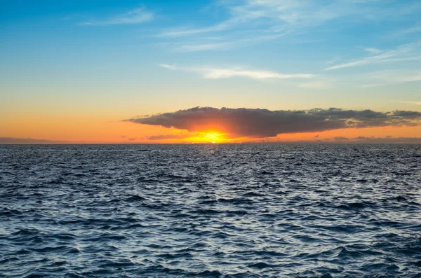 Sunset over the coast of Atlantic ocean — Stock Photo, Image