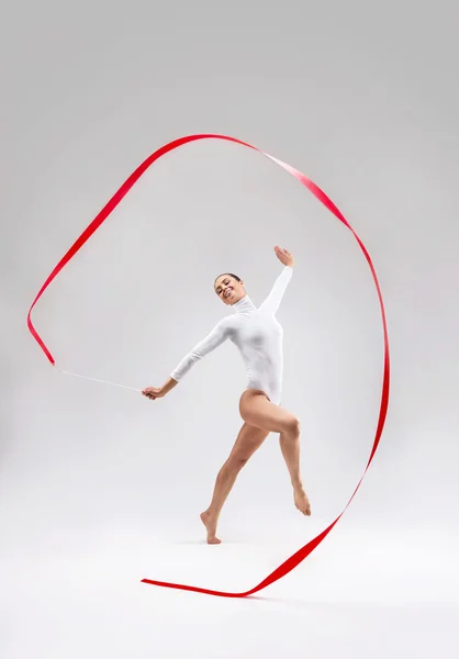 Acrobat with tape — Stock Photo, Image