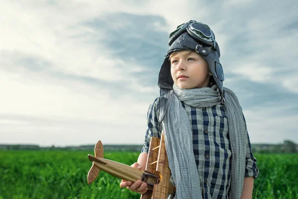 Little boy in a field — Stock Photo, Image