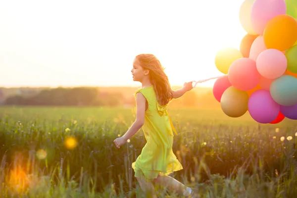 Active child in a field — Stock Photo, Image