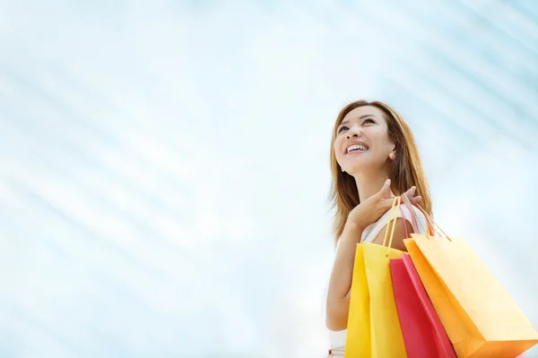 Shopaholic with shopping bag — Stock Photo, Image