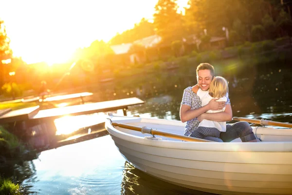 Family in the boat — Stock Photo, Image