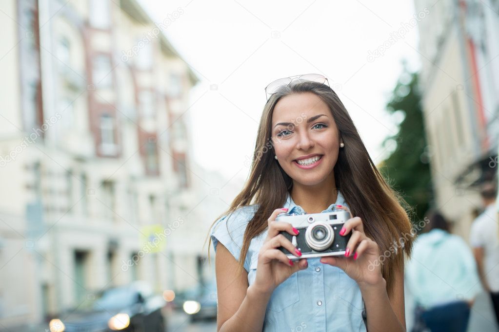 Smiling photographer outdoors