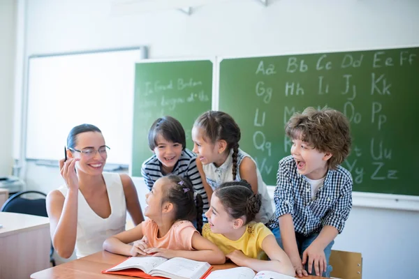 Pupils with teacher — Stock Photo, Image