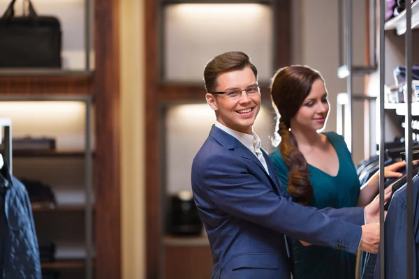 Happy couple in store — Stock Photo, Image