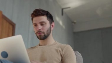 Successful man receiving good news on the internet