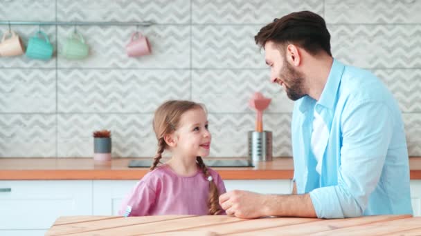 Little preschool girl giving gifts to her dad for fathers day — Stock Video