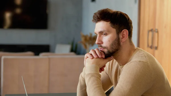 Young man at remote work in living room — Stock Photo, Image