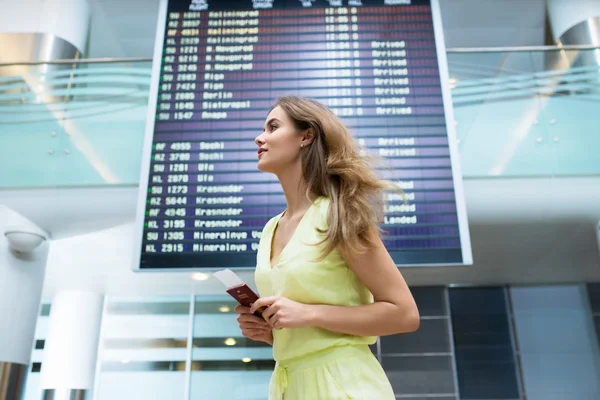 Young woman at the board — Stock Photo, Image