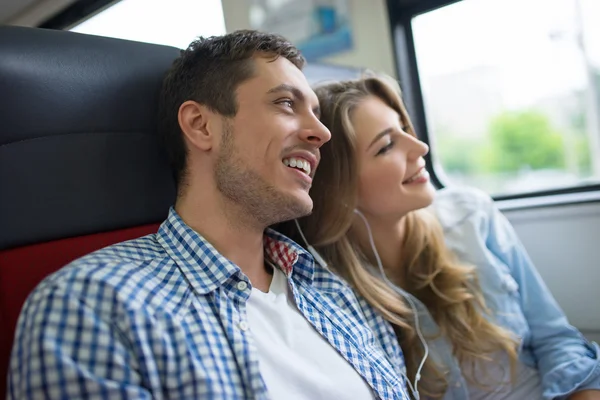 Happy couple in the train — Stock Photo, Image