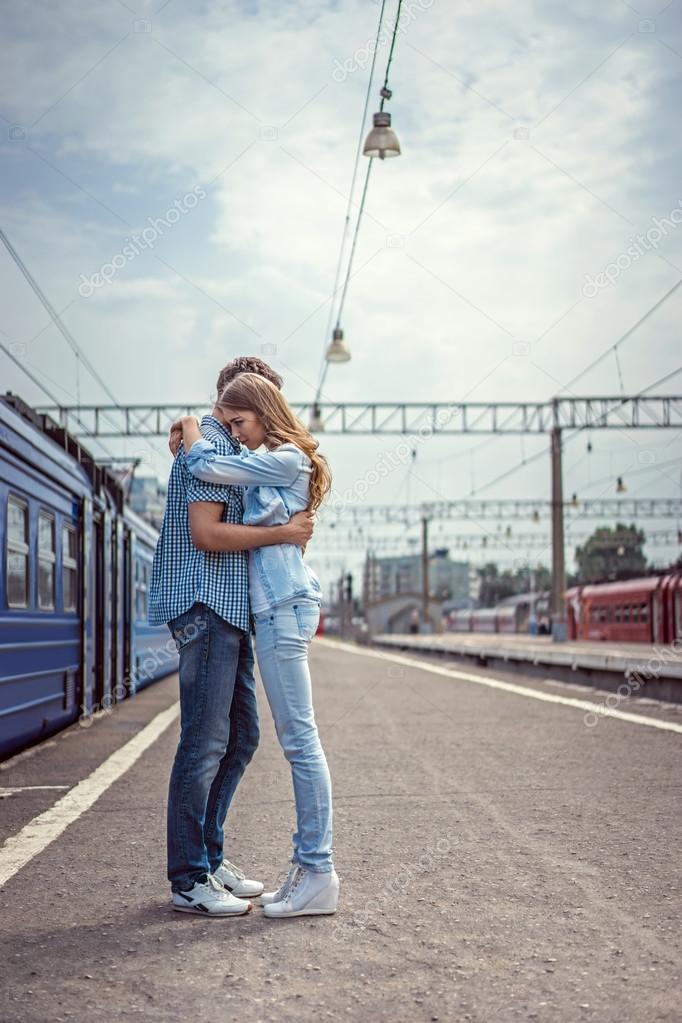 Couple hugging outdoors