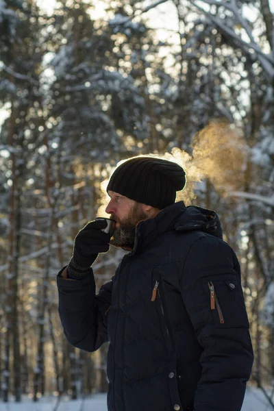 Frozen Man Beard Warms Hot Tea Thermos Winter Sunny Forest — Stock Photo, Image