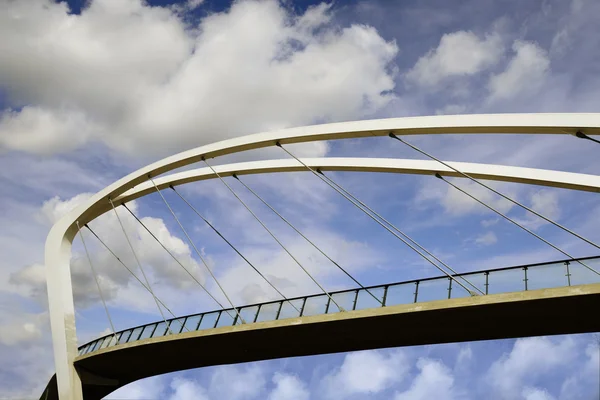 Pedestrian bridge against the blue sky — Stock Photo, Image