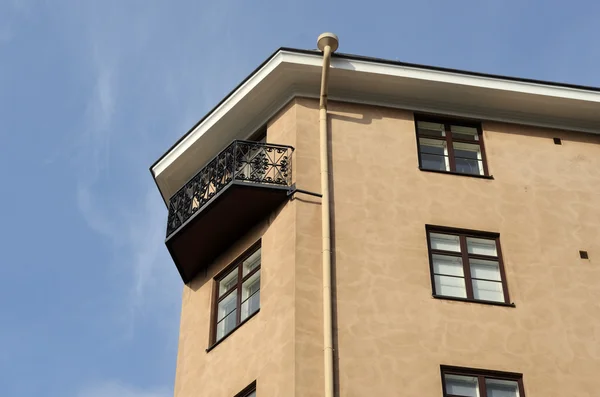 Balcony with a forged grille and downspout — Stock Photo, Image