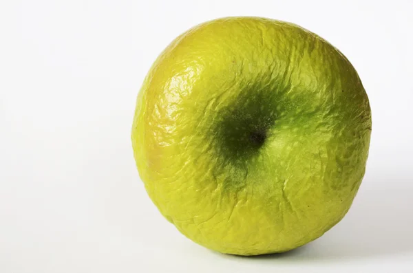 Contracted green dry apple — Stock Photo, Image