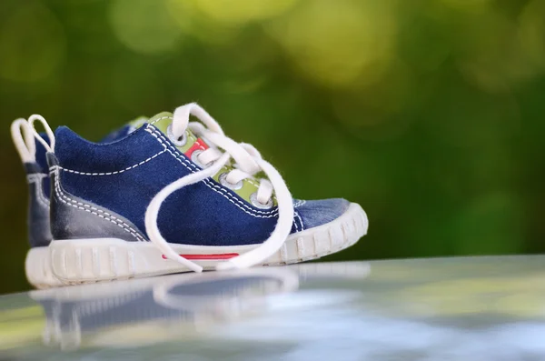 PERNIO, FINLAND, SEPTEMBER 7, 2013: A pair of childrens shoes — Stock Photo, Image