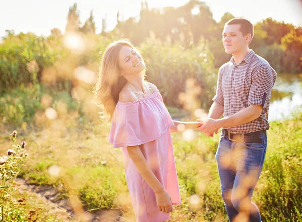 Shot Young Couple Holding Hands Running Park Blurry Movement Soft — Stock Photo, Image