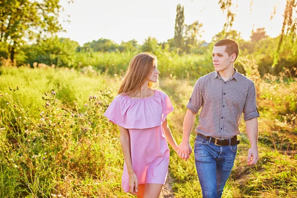 Shot Young Couple Holding Hands Running Park Blurry Movement Soft — Stock Photo, Image