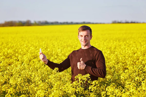 Young Man Yellow Canola Field Blowing His Nose Suffering Pollen — Stock Photo, Image