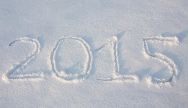 Text rita på snö — Stockfoto
