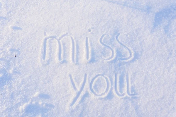 # Miss you written on snow # — Foto Stock