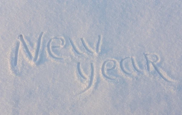 Gott nytt år skrivit på snö — Stockfoto