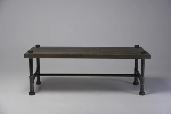 Modern loft wooden table studio shot — Stock Photo, Image