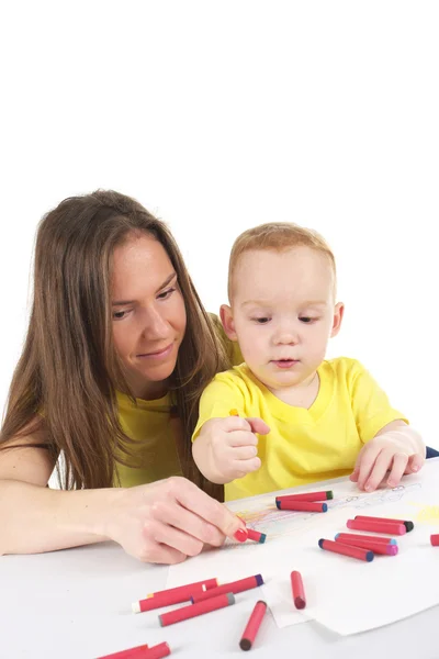 Mother and son are drawing the picture together — Stock Photo, Image