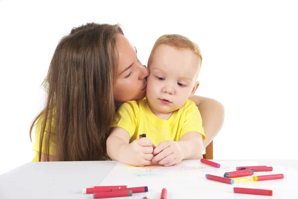 Mother and son are drawing the picture together — Stock Photo, Image