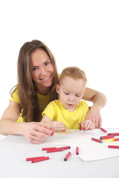 Mother and son are drawing the picture together — Stock Photo, Image