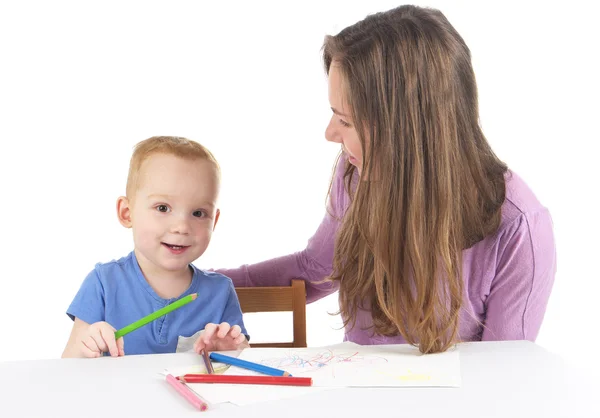 Moeder en zoon tekent de afbeelding samen — Stockfoto