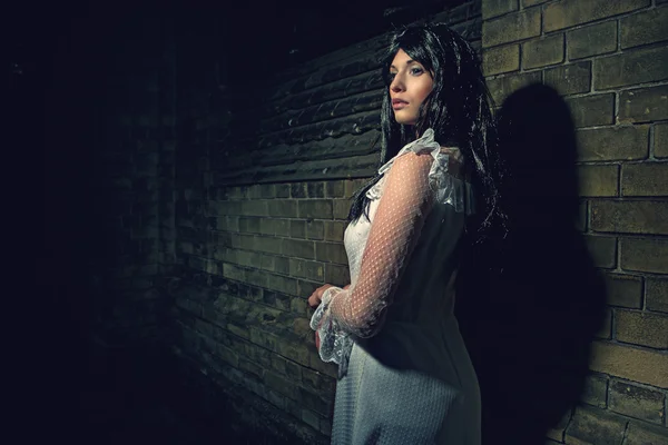 Witch from a crypt in the cemetery — Stock Photo, Image