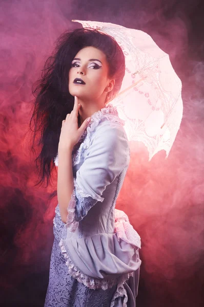 Beautiful Halloween vampire woman aristocrat with lace-parasol — Stock Photo, Image