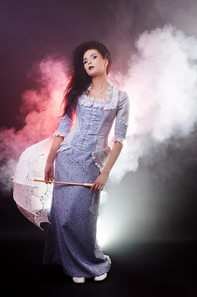 Beautiful Halloween vampire woman aristocrat with lace-parasol — Stock Photo, Image