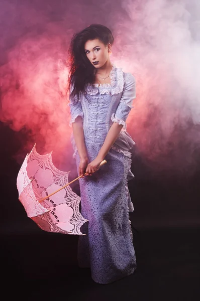 Beautiful Halloween vampire woman aristocrat with lace-parasol — Stock Photo, Image