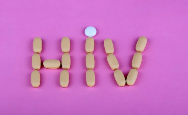 Thérapie hiv éfavirenz sur fond rose — Photo