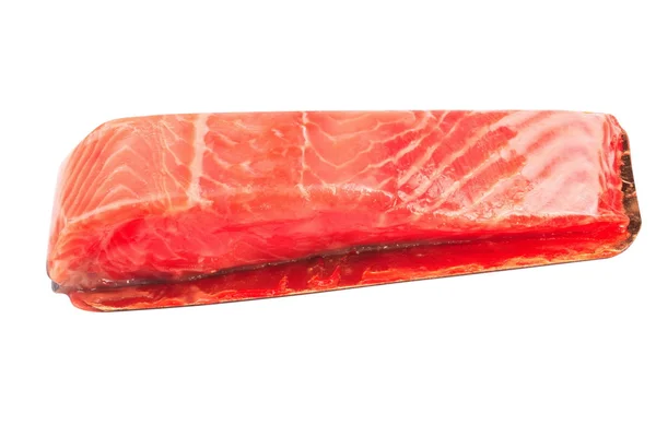 Bit av röd fisk filé isolerad på vit — Stockfoto