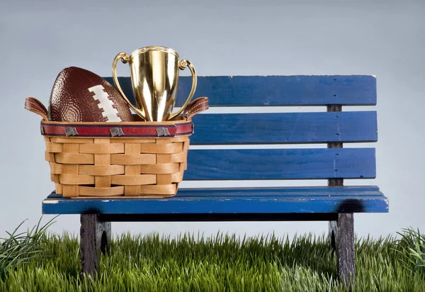 Park bench and football . — Stock Photo, Image