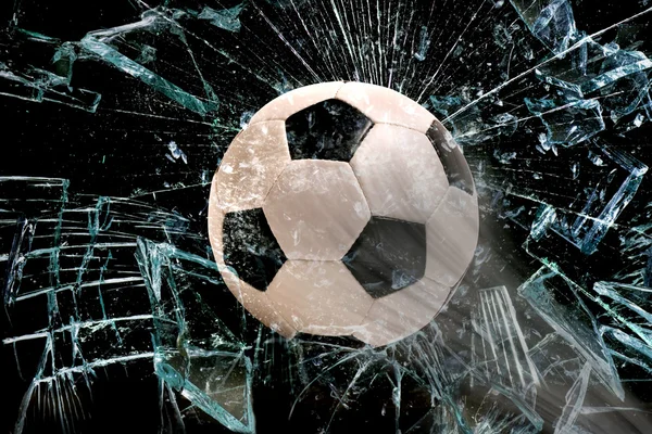 Ballon de football à travers le verre . — Photo