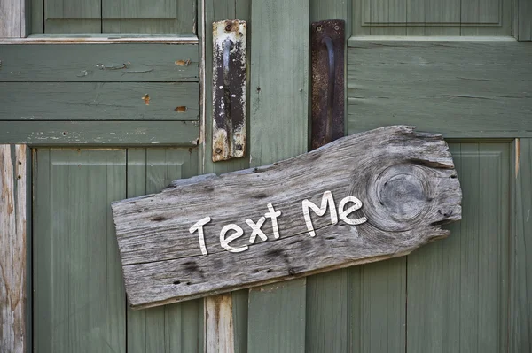 Text Me Sign. — Stock Photo, Image
