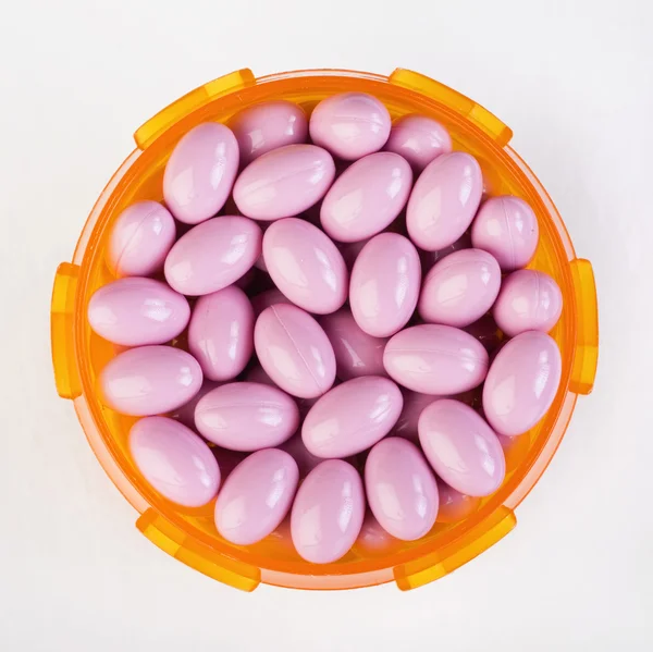 Маленькі рожеві таблетки — стокове фото