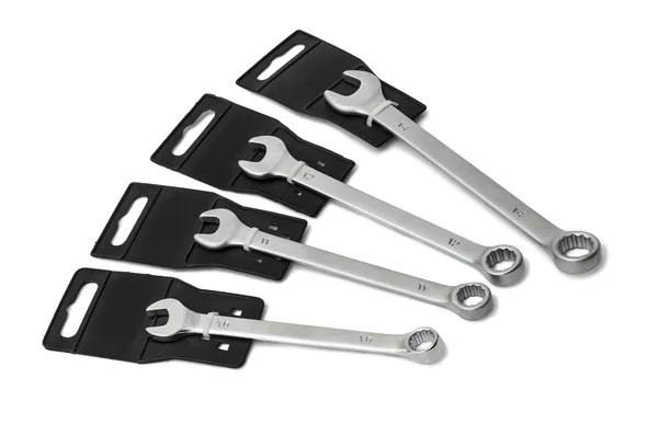 New wrenches it is isolated on a white background — Stock Photo, Image