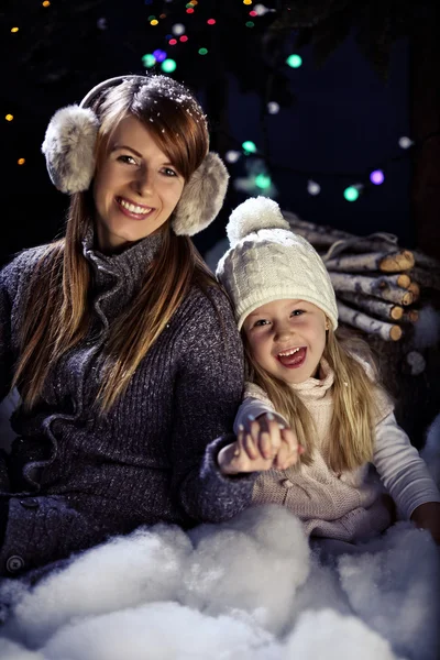 Fun in the snow - mother and daughter — Stock Photo, Image
