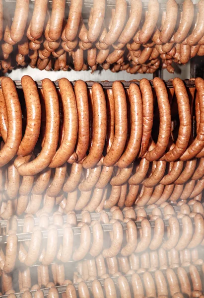 Appetizer sausage in smokehouse — Stock Photo, Image