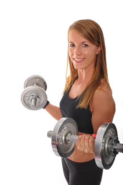 Schöne Fitnesstrainerin mit Kurzhanteln — Stockfoto