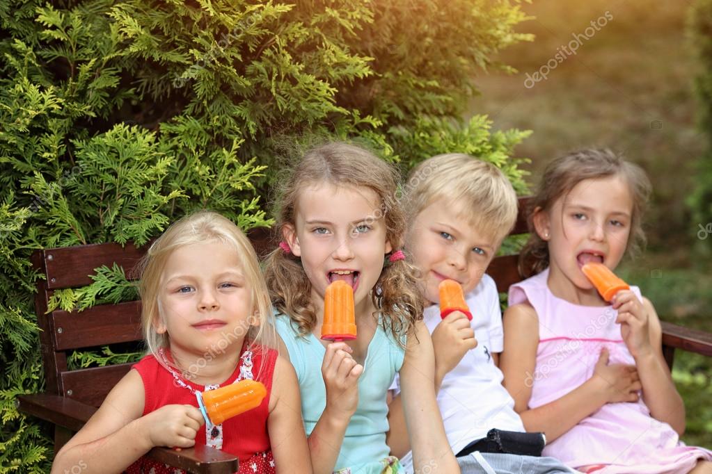 Friends eating ice cream Stock Photo by ©ambrozinio 117944430
