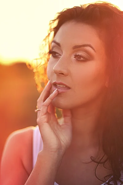 Portrait beautiful woman with curly hair — Stock Photo, Image